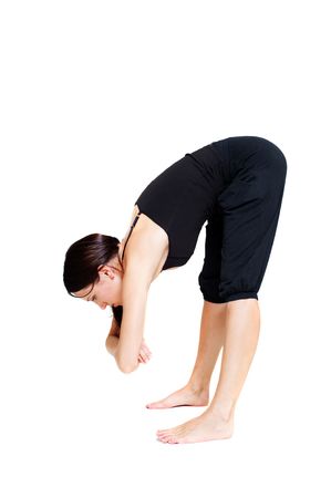 young woman doing stretch exercise. isolated on whiteの写真素材