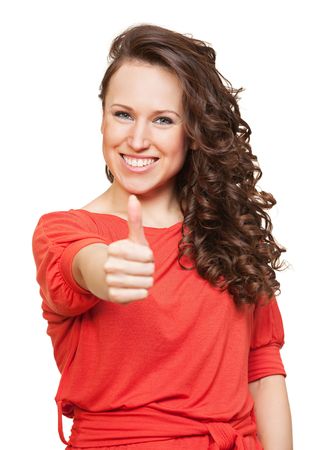 bright portrait of happy woman with thumbs up. isolated on whiteの写真素材