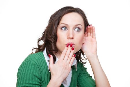 portrait of amazed woman eavesdroping. isolated on white background