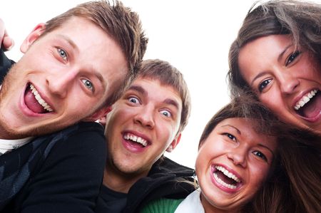 portrait of cheerful young people over white backgroundの写真素材