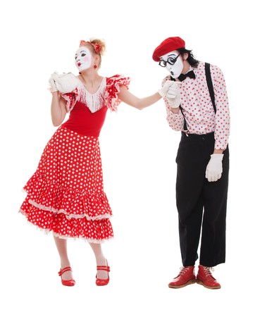 portrait of mimes in love. man kissing womans hand. の写真素材