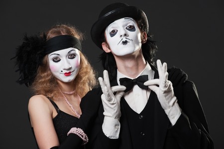 portrait of retro mimes over black backgroundの写真素材