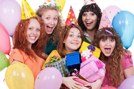 portrait of joyful women with gifts and balloons. isolated on white background の写真素材