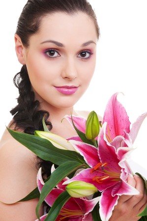 portrait of lovely woman with bunch of flowers の写真素材