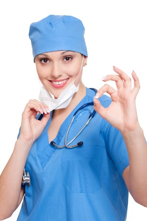 successful nurse showing ok sign. isolated on white backgroundの写真素材