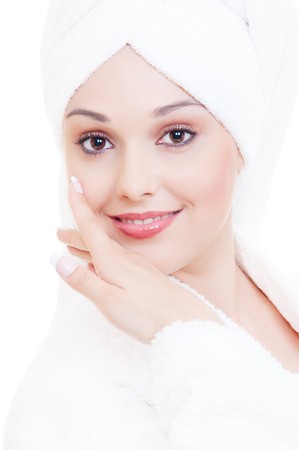portrait of pretty young woman in white towelの写真素材