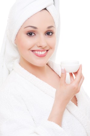 happy young woman with face cream after showerの写真素材