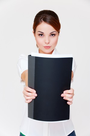 serious businesswoman showing her report in black folder
