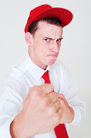 funny portrait of expressive man in red capの写真素材