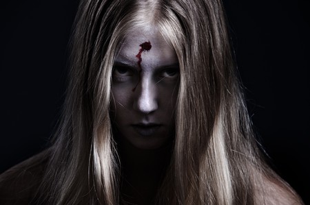 portrait of zombie with wound on forehead. halloween theme の写真素材