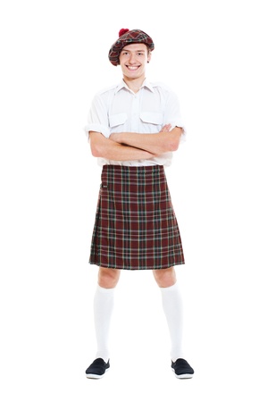 portrait of happy guy in national scotch clothes. isolated on white backgroundの写真素材
