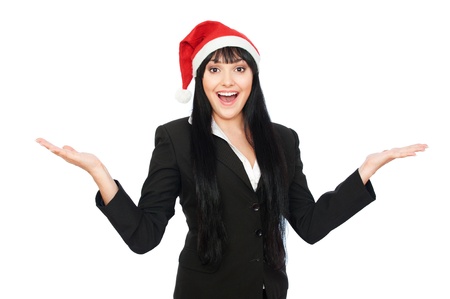 laughing happy businesswoman in santa hat. isolated on white backgroundの写真素材