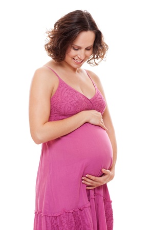 portrait of pretty pregnant woman in pink sundress. isolated on white background の写真素材