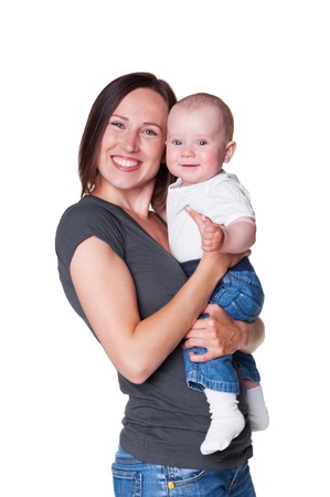 happy and smiley mother holding her baby. isolated on white backgroundの写真素材