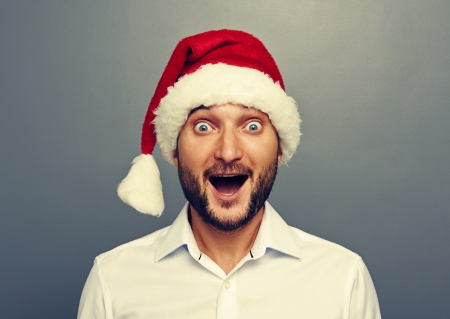 funny christmas man over grey backgroundの写真素材