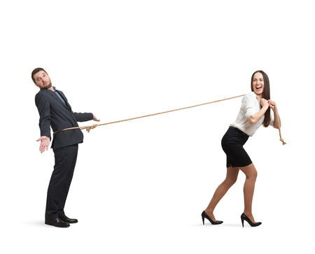 laughing woman lugging man in perplexity. isolated on white background
