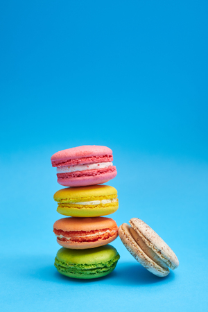 Delicious stack of colorful homemade macaroons. Homemade and colorful macaroon cookies towerの写真素材
