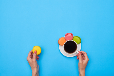 Coffee and homemade confection over blue flatlayの写真素材