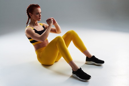 sportswoman doing crunchesの写真素材