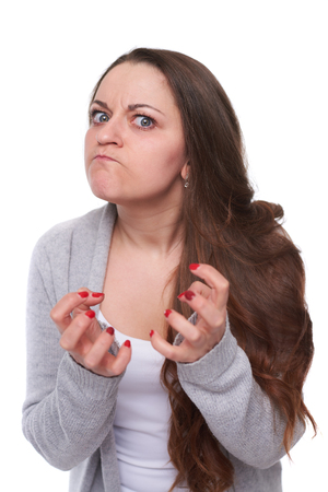 angry woman in studioの写真素材