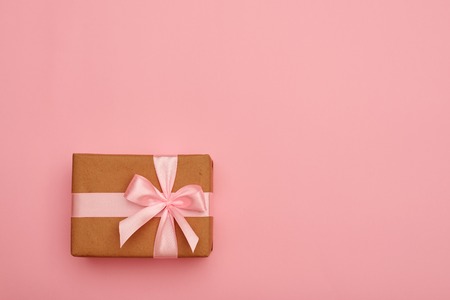 Present box with pink bowの写真素材