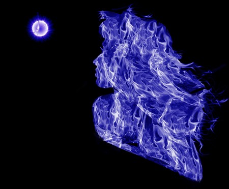 Silhouette of girl from dark blue fireの写真素材