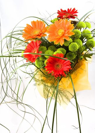 Bouquet from five gerberum and green branchesの写真素材