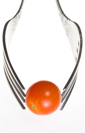 Two plugs and one tomato cherries