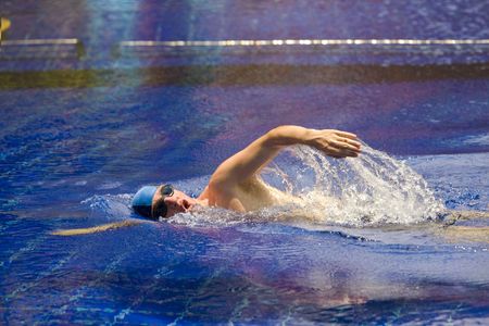 The young sports swimmer in pool The young sports swimmer in pool