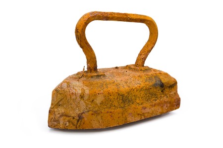 Old rusty pig-iron iron on white backgroundの写真素材