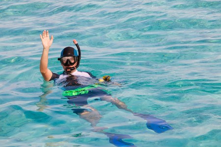 Man in flippers and mask in ocean, Maldivesの写真素材