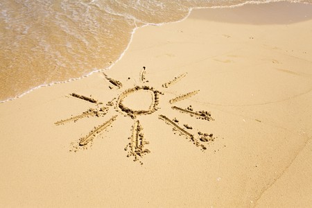 The sun - a picture on sandの写真素材