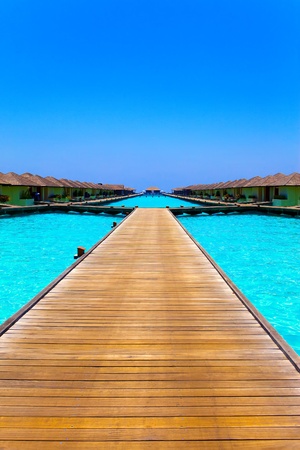 Maldives. A wooden road over oceanの写真素材