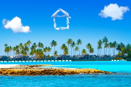 The house from clouds over the sea and palm trees - dream of the house on paradise island

の写真素材