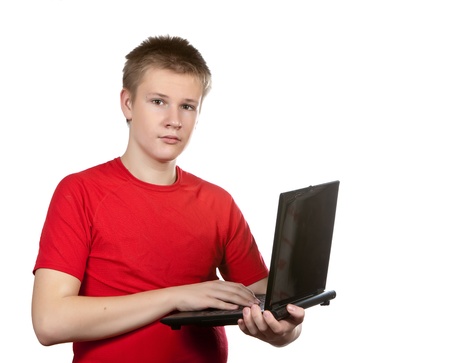 The teenager with the laptop. の写真素材