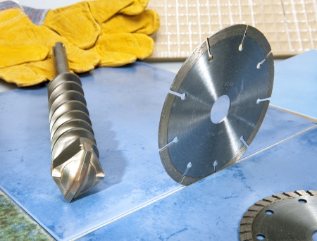 Nozzles for the puncher and a detachable diamond disk on a tile.の写真素材