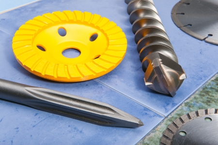 The tool -  Nozzle for the puncher and a grinding diskの写真素材