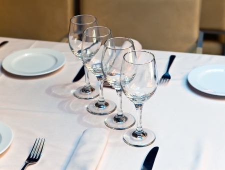 Glasses on  table at restaurantの写真素材