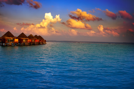 Maldives. 
Villa on piles on water at the time sunset
のeditorial素材