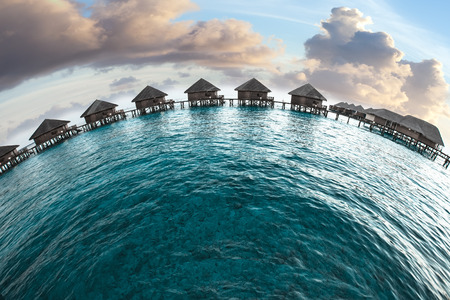 Maldives. houses on piles on waterの写真素材