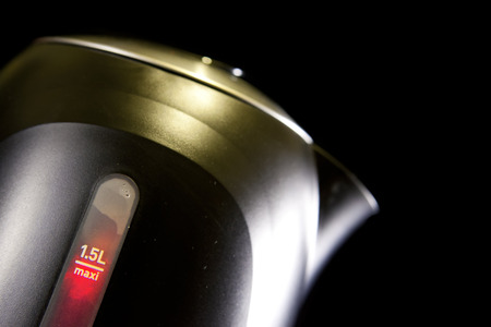 Measured mark water level of the electric kettle, red color - a boiling signの写真素材