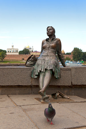 GREAT NOVGOROD - JULY 22: Sculpture "The girl on the bridge"on July 22, 2010 in Great Novgorod, Russiaのeditorial素材