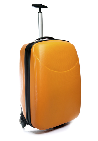 Orange suitcase for travelの写真素材