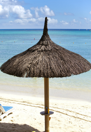 Sun-protection umbrellas, beach, sea. Mauritiusの写真素材