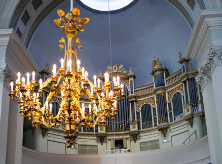 organ in Helsinki Lutheran cathedral (St. Nicolas church) and chandelier out of focus, Finlandのeditorial素材