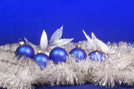 Blue New Year's balls  on a blue backgroundの写真素材