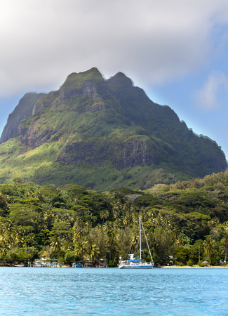 The blue sea and clouds over the mount Otemanu on Bora Bora island, Polynesia.の写真素材