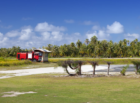 Fire engine on a take off field of small tropical island