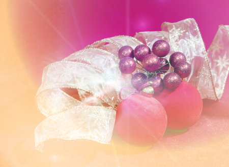 New Year's composition on a red background - ball and ribbonの写真素材
