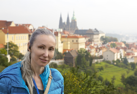 The woman the tourist on a beautiful background of the old city, Prague.

の写真素材
